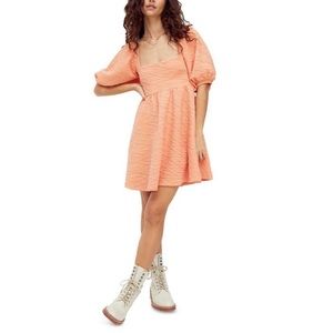Free People Violet Mini Dress in color grapefruit. Size L.